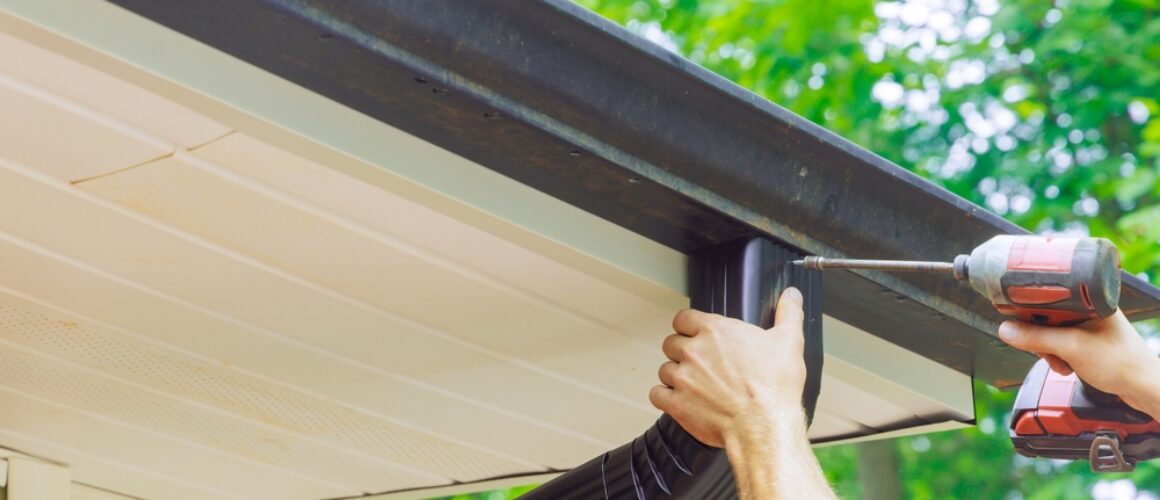 Assembling,Installing,Gutter,Channels,On,Roof,Of,Home