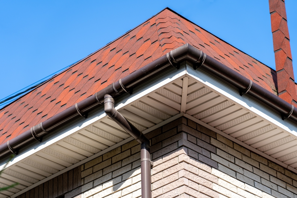 Brown,Roof,Of,House,Covered,With,Flexible,Bitumen,Motleysoft,Shingles