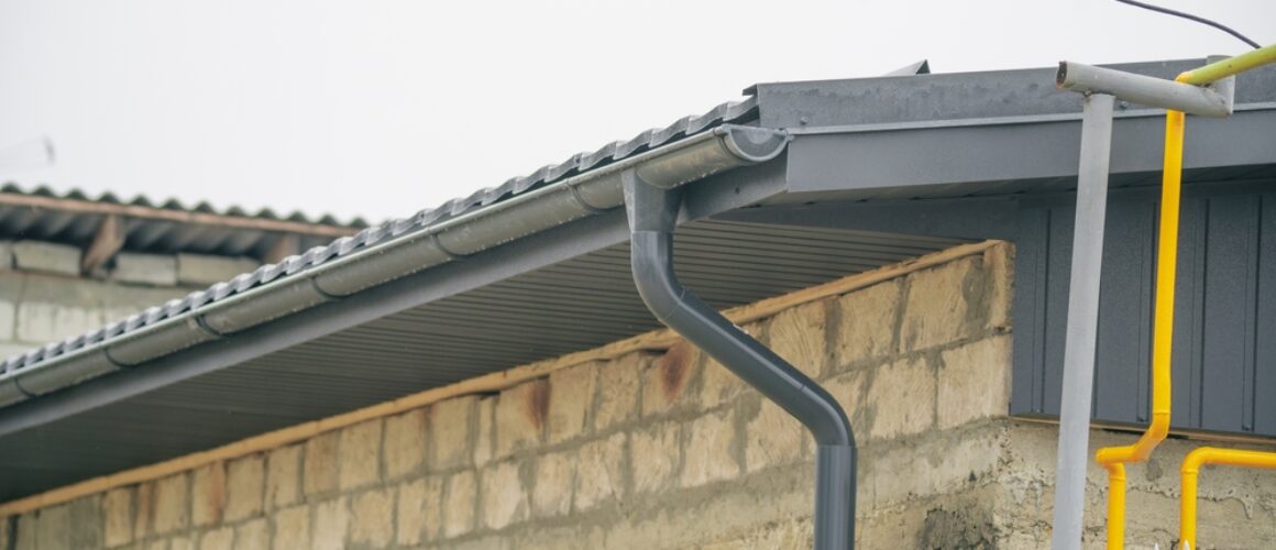 Close-up,View,Of,A,Roof,Gutter,On,A,Stone,Building